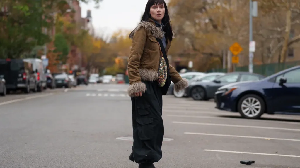 Lola Petticrew as Catherine running on street in Furious Hulu Episode 6